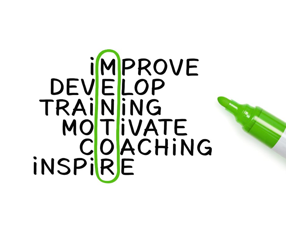 Text on a whiteboard that has the word MENTOR circled in green, and it is bisected by the following words: IMPROVE, DEVELOP, TRAINING, MOTIVATE, COACHING, INSPIRE.